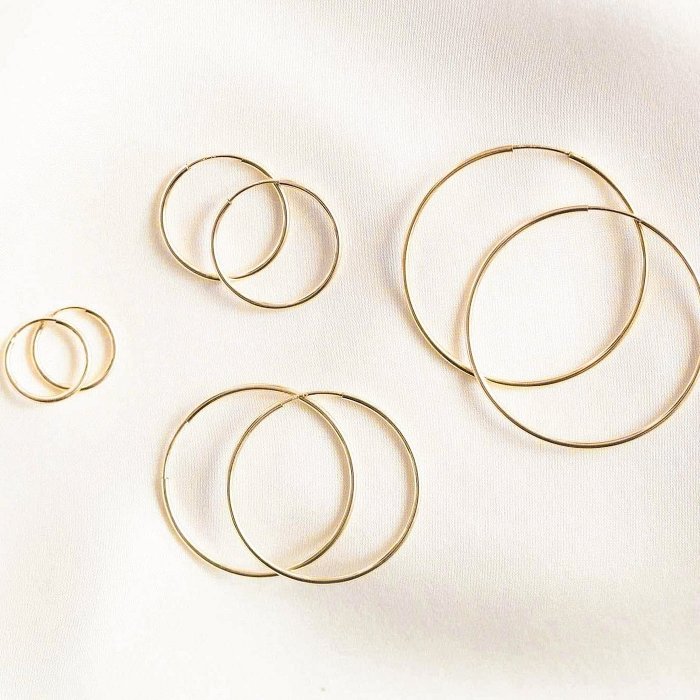 Small (14mm) Medium (20mm) Large (30mm) X-Large (38mm) 2X-Large (50mm) Thin Hoop Earrings by Simple & Dainty Jewelry