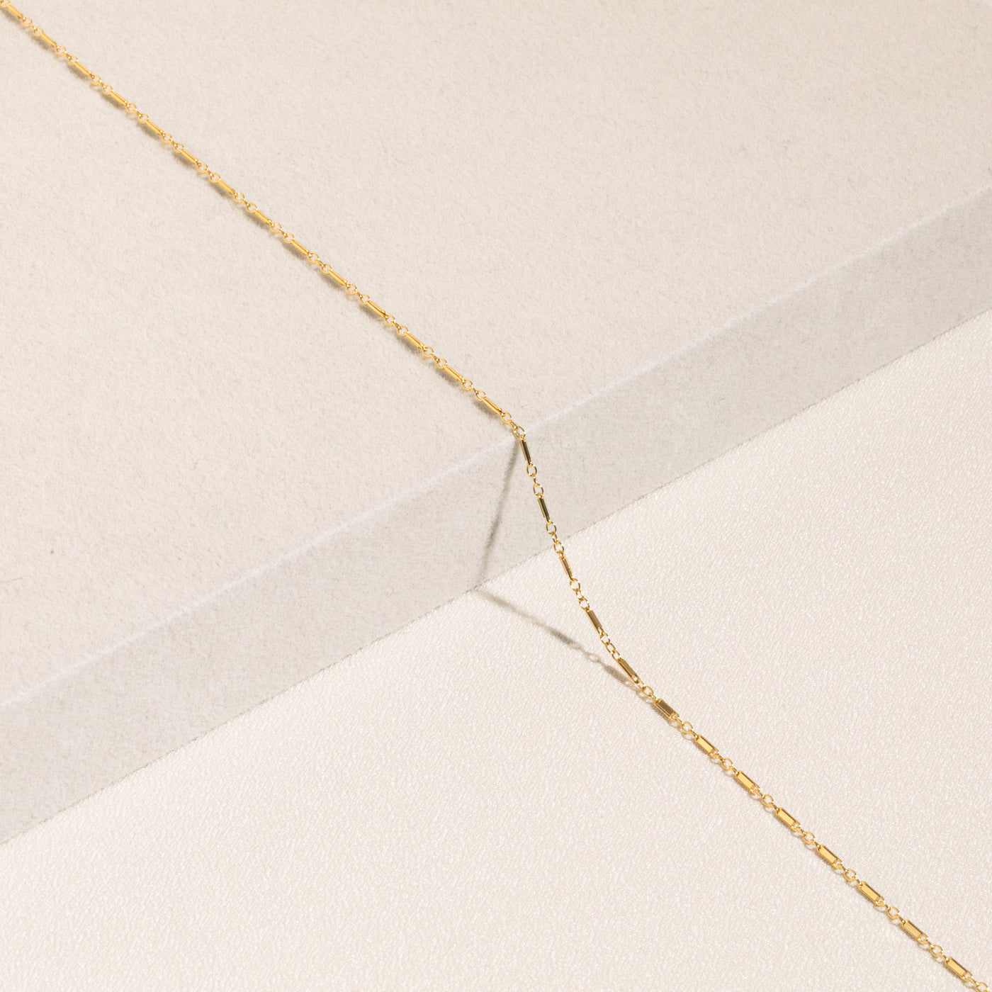 Dainty Shimmer Chain with alternating bars and tiny hoops. Made in gold filled