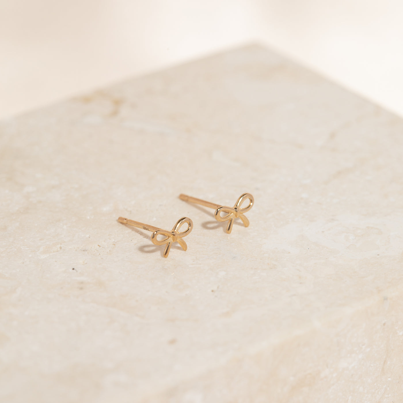 Lele Sadoughi Pearl Bow Stud Earrings in Pearl | REVOLVE Lele Sadoughi Pearl Bow Stud Earrings in Pearl | REVOLVE