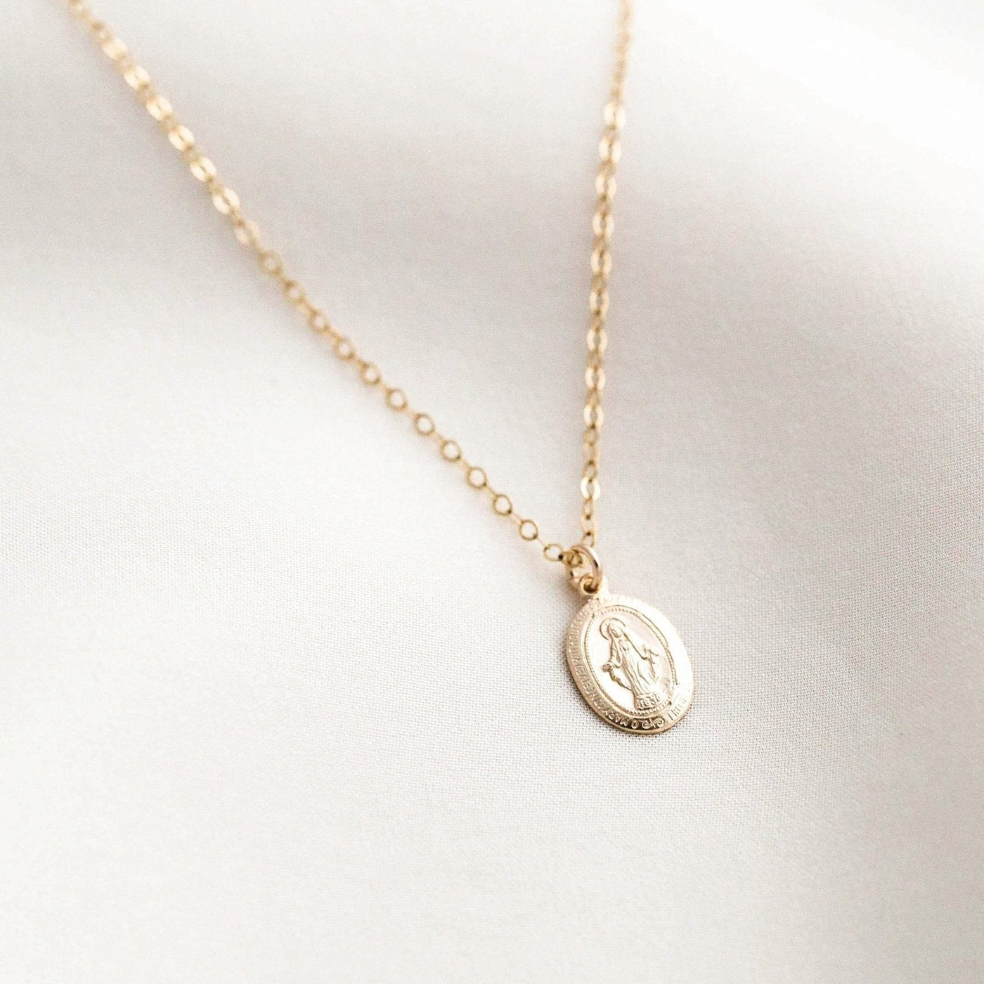 Tiny Virgin Mary Necklace by Simple & Dainty Jewelry