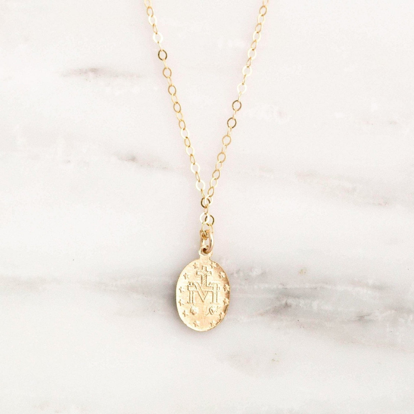 Tiny Virgin Mary Necklace by Simple & Dainty Jewelry