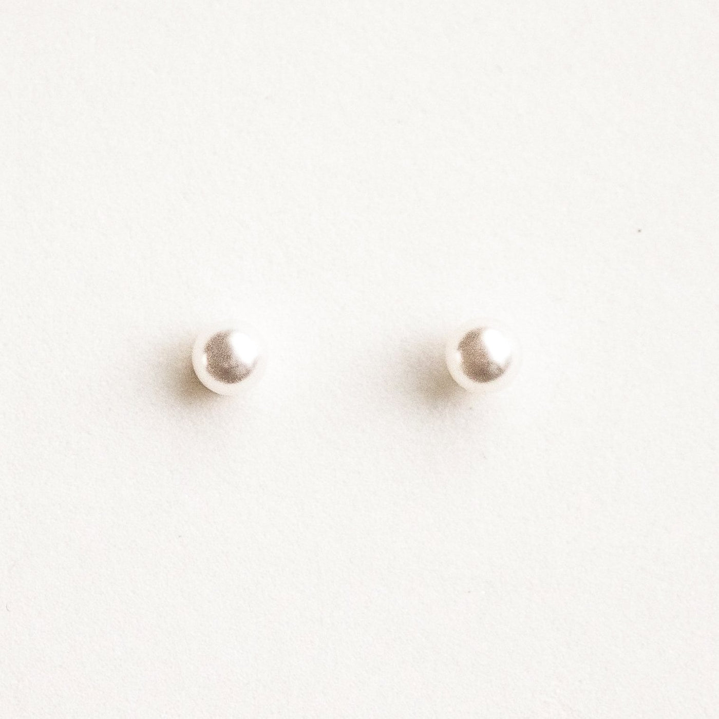 Pearl Stud Earrings by Simple & Dainty Jewelry